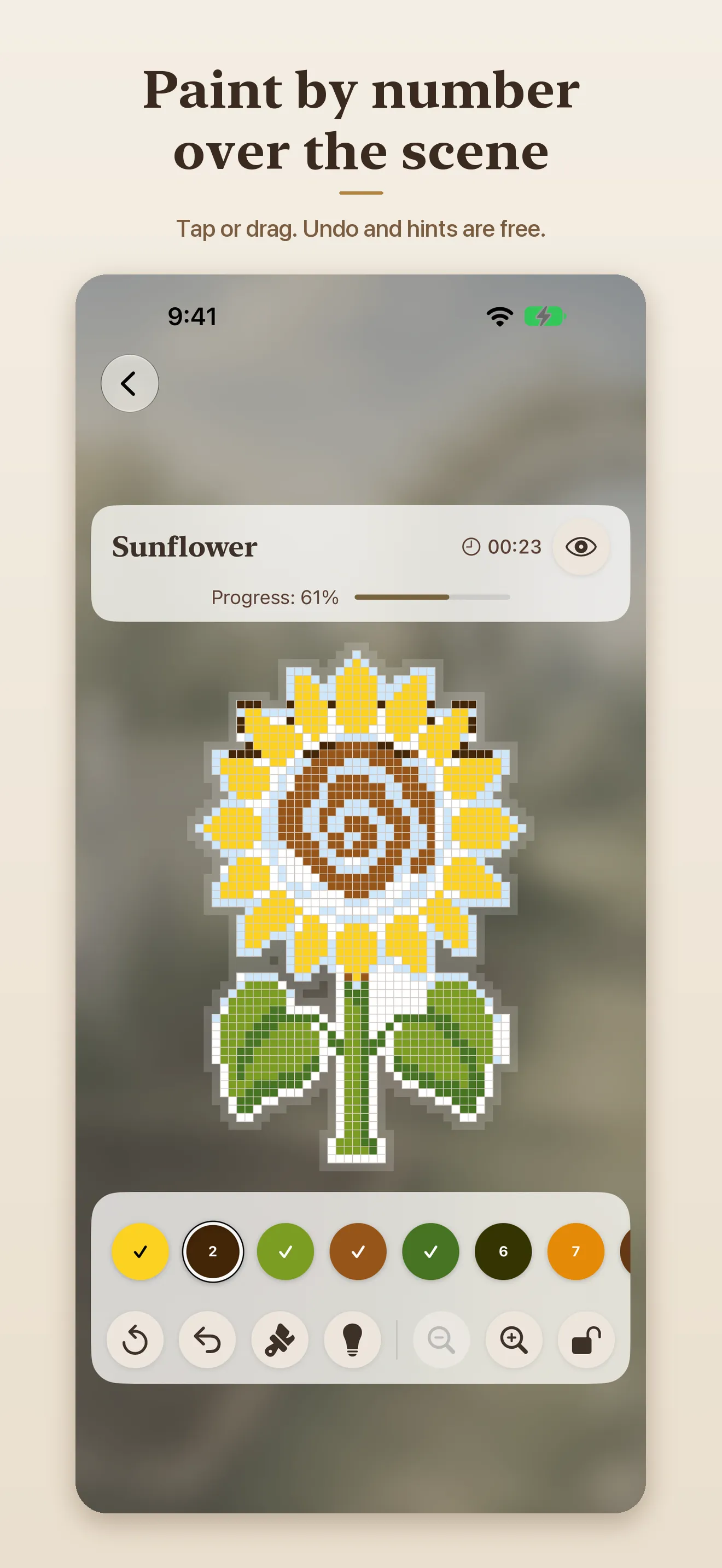 Painting a pixel-art sunflower by number over the blurred scene